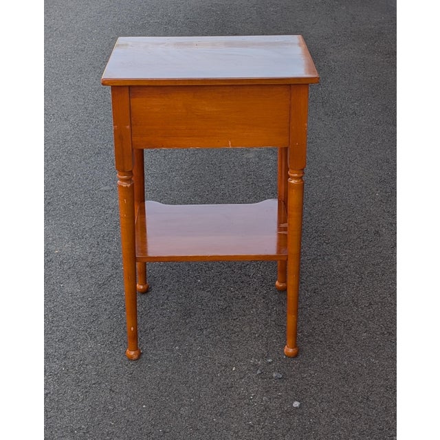 Enhance your interior with this authentic Mid-Century Modern Whitney Furniture side table, expertly crafted from warm...