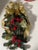 Handmade Christmas swag with blown glass gold angel figurine.