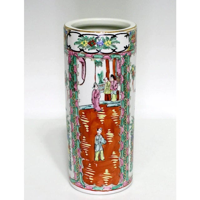 A good sized 1950's Chinese porcelain 'hat stand' vase. This hand painted piece has rich colorful enamels in the...