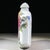 This is a charming vintage porcelain snuff bottle, decorated in the famille rose palette with vibrant polychrome enamels....