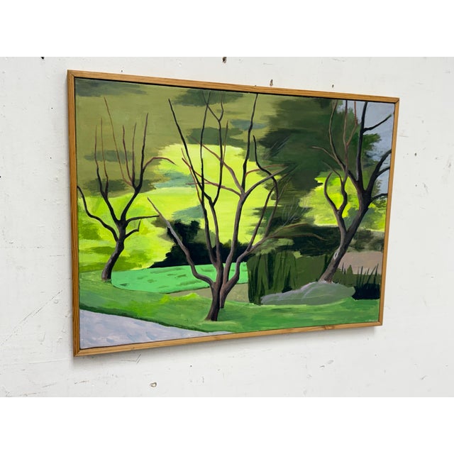 Design Plus Gallery presents a Framed Landscape Painting of Bare Trees in a Green Area. The trees in the painting may have...