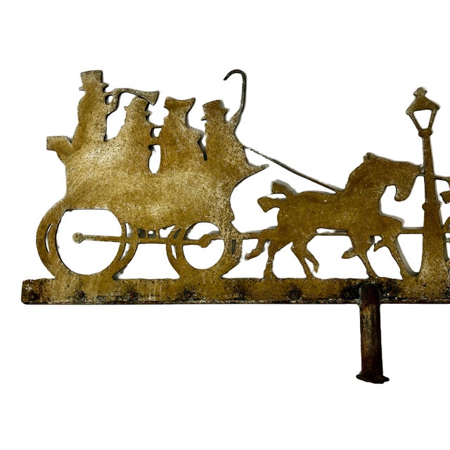 On offer is a classic mid-20th-century American Folk Art "Coach and Horses" silhouette weathervane top, crafted out of a...