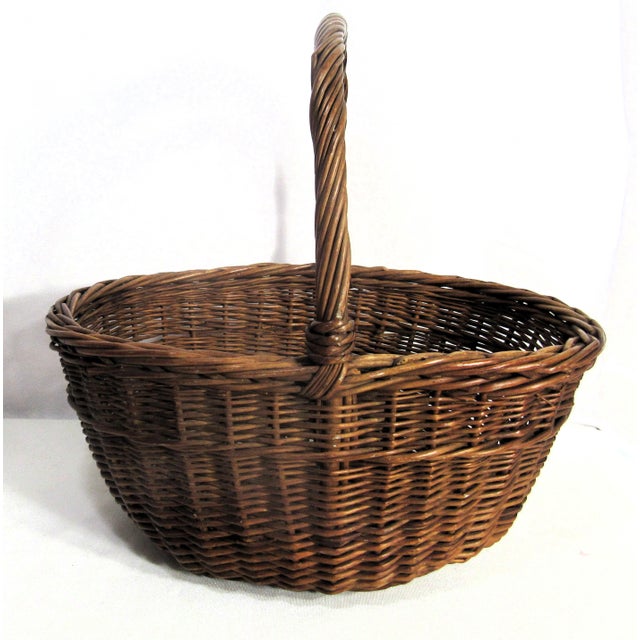 I can't resist the charm of a sweet vintage basket. This is a wicker gathering basket. It is in excellent condition,...