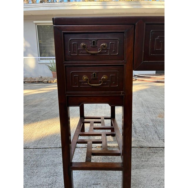 A beautifully crafted vintage Chinese Ming-style scholar desk constructed from solid rosewood (hongmu-type hardwood),...