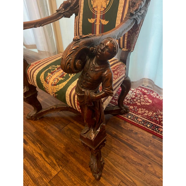 Stunning Italian 19th Century Baroque Style Carved Walnut Figural Throne Armchair, attributed to Valentino Panciera...