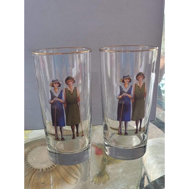 Elevate your home bar with this charming set of vintage B. Brian Atwater glasses. Featuring a classic 1920s Ladies Golfing...