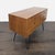 This dresser features a classic mid-century modern design with six spacious drawers for storage. The warm wood finish and...