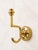This exceptional set of seven wall hooks is crafted from high-quality solid brass and embodies the timeless elegance of...