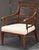 A fine period Georgian vernacular reading chair from England, circa 1820, featuring an elegant frame with a comfortable...