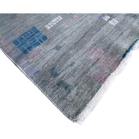 Beautiful hand knotted modern rug. Made of wool with very modern design and colors, this extremely gorgeous rug is an eye-...
