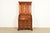 A beautiful Georgian or Chippendale style bureau with drop front secretary desk and bookcase hutch top By Henkel Harris...