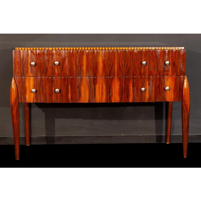 Art Deco dresser with six drawers and brass hardware, inlaid fluted board top. This commode an elegant look offer ample...