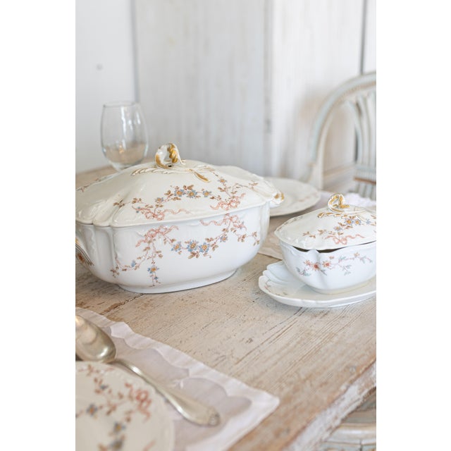 A beautifully coordinated Vintage French Porcelain Dinner Service for 12, this elegant set captures the timeless...