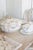 A beautifully coordinated Vintage French Porcelain Dinner Service for 12, this elegant set captures the timeless...
