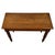 A handsome early 20th-century English side table, finely crafted from oak and distinguished by its elegant proportions,...