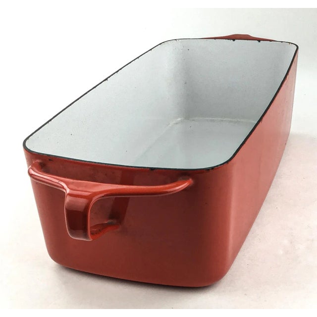 Bright red Dansk France extra long heavy enamel loaf pan. This beauty can be baked in the oven or simply serve your...