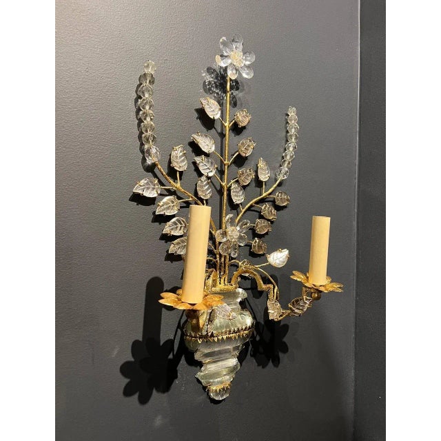 A pair of circa 1930’s french gilt metal sconces with glass leaves