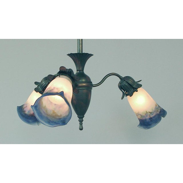 International marriages work for me, and here’s one that will last. The fixture itself is American, a 3-light solid brass...