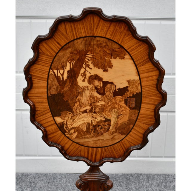 Vintage: Late 19th Century Tilt Top Table has a Black Forest Style. Origin: Swiss, German. The Table has an Inlaid Top -...