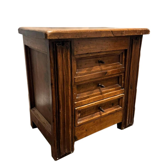 Spanish 17th century three-drawer chest in solid carved walnut wood, with molded sides following late Gothic designs, and...