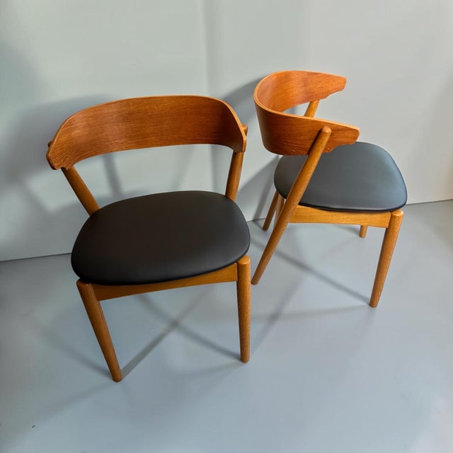 A beautiful pair of vintage banjo dining chairs by ikea, sweden, dating from the 1950s–1960s. the chairs feature an...