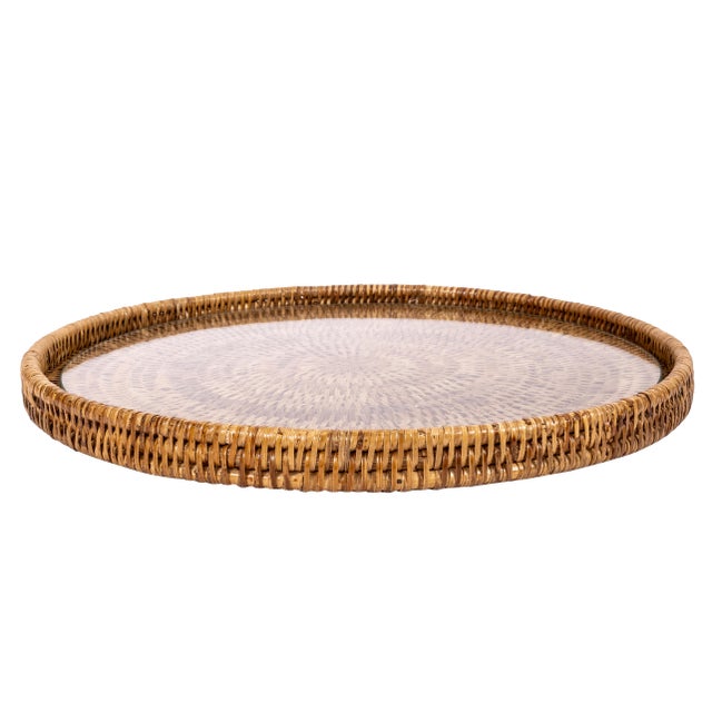 Our handwoven rattan round flat trays with glass insert offer a beautiful way to both decorate and protect your surfaces....