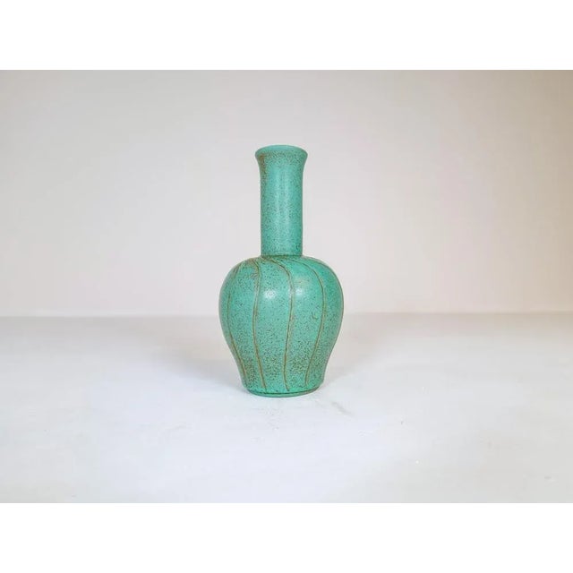 Wonderful ceramic vase manufactured in Sweden at Bo Fajans and designed by Ewald Dahlskog 1937. The shape and lines of the...
