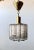 A pendant Nordlys series designed by Eric Wärnå, circa 1960. Produced Kemp & Lauritzen. Denmark. Clear stripe glass with...