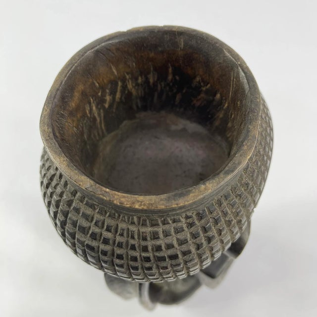 The Kuba people of the Democratic Republic of the Congo are well known for their finely carved wooden objects,...