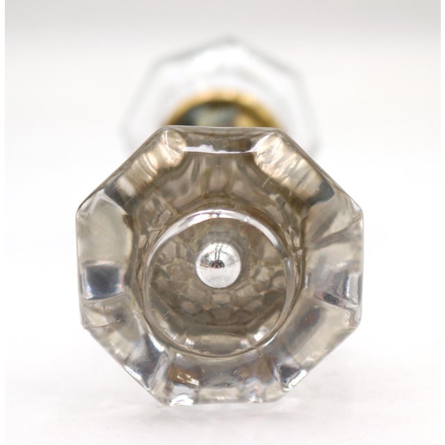 Octagon shaped clear glass door knobs with a center bullet and brass shank. Priced as a pair of knobs with a spindle. Good...