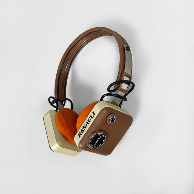 France modern headphone radio by Renault Sound Radio, 1970s Radio headphones with brown plastic frame. The oval earpieces,...