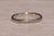 The Central Ave: White Rose Signed Antique Wedding Band Circa 1934. This antique wedding band is complete with a faintly...