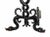 Rare and interesting pair of Arts and Crafts style wrought iron andirons. Intertwining serpentine form shafts terminate in...