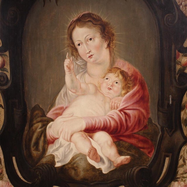 Antique 17th-century Flemish painting. Oil on panel artwork depicting a splendid Madonna and Child within a niche,...
