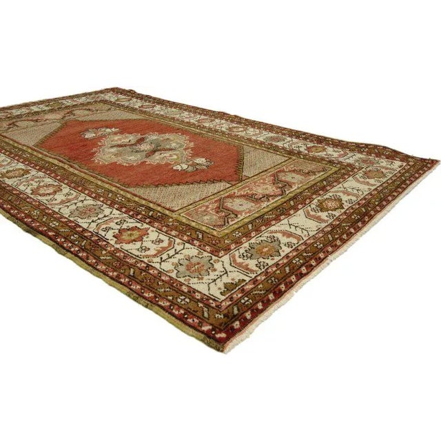 vintage Turkish Oushak accent rug, entry or foyer rug. This hand knotted wool vintage Turkish Oushak rug features a cusped...