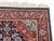 Persian Hamadan Wool Rug, with floral and geometric design on blue and red ground. 3' 2" L x 2' W. Provenance: The...