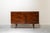 Nordic rectangular sideboard with two drawers and two doors with interior shelves, mounted on four tapered wooden legs,...