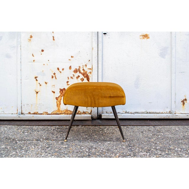 Stool with padded seat upholstered in velvet, metal legs, and brass feet. Made in Italy 1950s