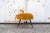 Stool with padded seat upholstered in velvet, metal legs, and brass feet. Made in Italy 1950s