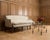 An elegant 19th century English Georgian Cabriole sofa or settee, featuring a beautifully Neoclassical decorated hardwood...
