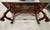 A striking example of late 19th-century Southern European craftsmanship, this Spanish Baroque style trestle table...