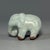 This antique Chinese ceramic elephant figurine is covered in soft celadon glaze with natural crackle. A charming small...