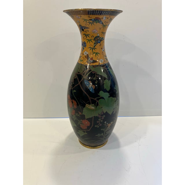Large 18 inch high cloisonné vase from the 20’s Amazing detail with flowers , vines and several garden creatures including...