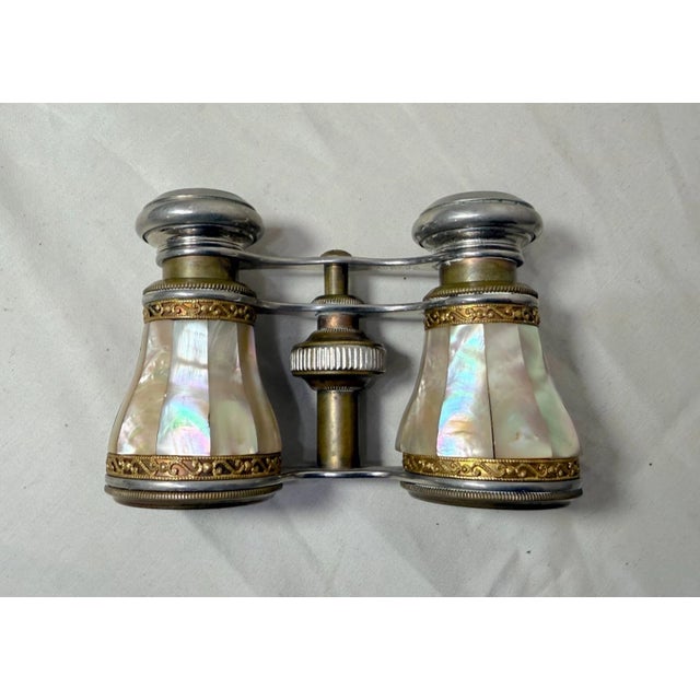 Up for sale is a rare and unique set of antique French pearl opera glasses from the 19th century. Made by the prestigious...