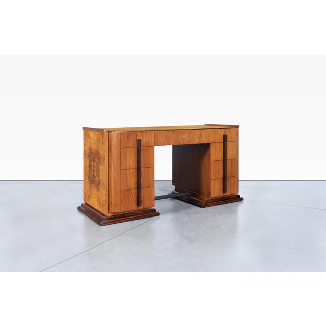 Vintage American Art Deco desk crafted in the United States, circa 1930s. Defined by its striking symmetry and luxurious...