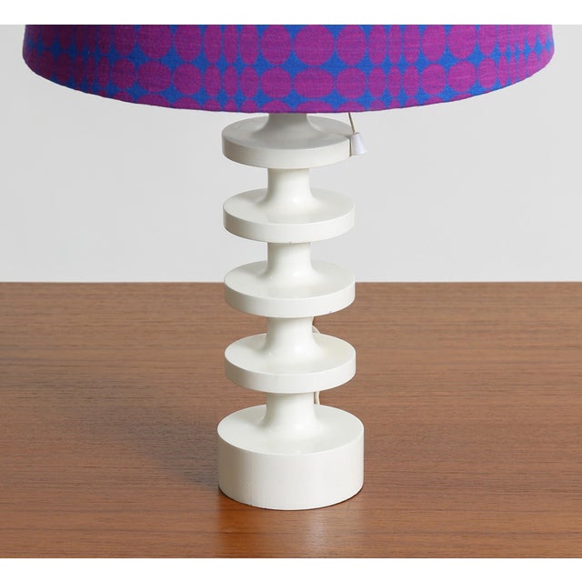 Vintage Swedish table lamp by Uno & Östen Kristiansson for Luxus, Vittsjö, circa 1960s. This lamp features a newly...