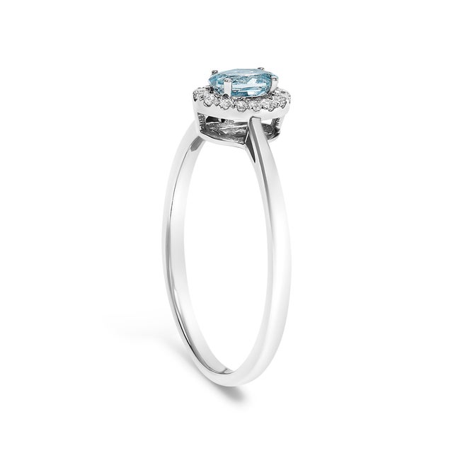 Early 21st Century 10K White Gold 5X3MM Oval Blue Aquamarine and Diamond Accent Halo Ring (I-J Color, I1-I2 Clarity) - Ring Size 6 For Sale - Image 5 of 7