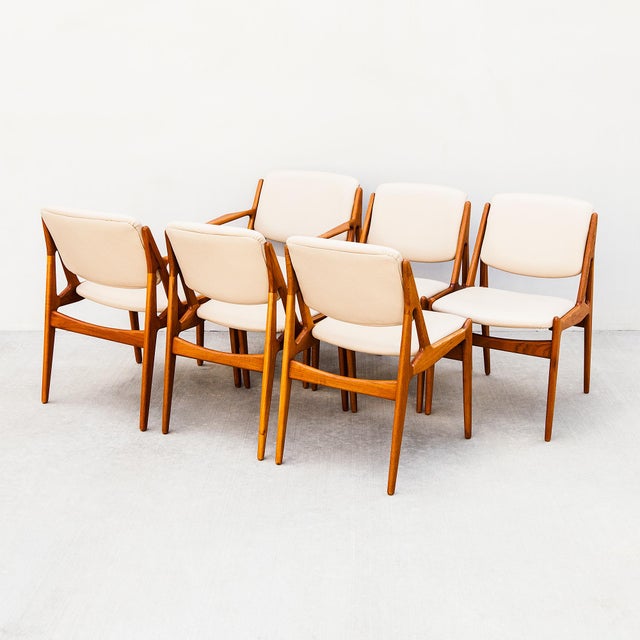 Gorgeous set of 6 "Ella" tilt-back dining chairs by Arne Vodder, made in Denmark by Vamo Sonderborg in the 1960s. Ella is...
