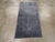 This mid-20th century Chinese Art Deco rug, showcases a minimalist yet sophisticated design. Featuring a solid blue field...
