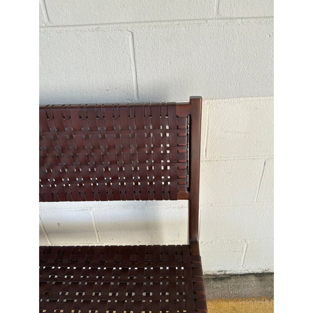 Stylish Made Goods Co Percy Leather Banquette. Dark brown wood frame, brown weaved leather. Original retail $2840....